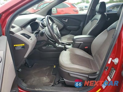 Zdjęcie 7 z 13 samochodu: 2012 HYUNDAI TUCSON GLS VIN:KM8JUCAC6CU395250 - miniatura