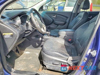 Zdjęcie 7 z 14 samochodu: 2012 HYUNDAI TUCSON LIMITED VIN:KM8JUCAC2CU435517 - miniatura