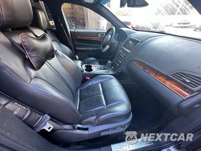 Piąte zdjęcie samochodu w środku: 2014 LINCOLN MKT VIN:2LMHJ5NK0FBL03293 - miniatura