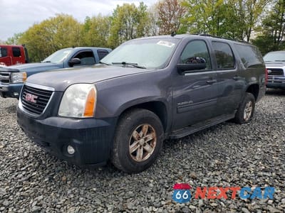 2010 GMC YUKON XL K1500 SLT 1GKUKKE35AR239149 - główne zdjęcie licytacji z USA - miniatura