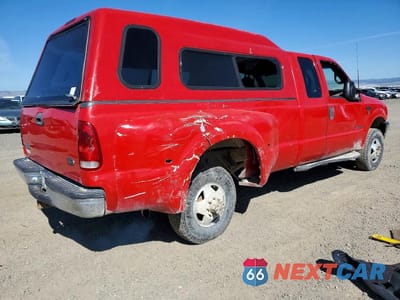 Trzecie zdjęcie samochodu z tyłu: 2000 FORD F350 SUPER DUTY VIN:1FTWX33F7YEE53635 - miniatura