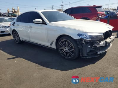Czwarte zdjęcie samochodu z boku: 2019 BMW 530E VIN:WBAJA9C56KB399367 - miniatura