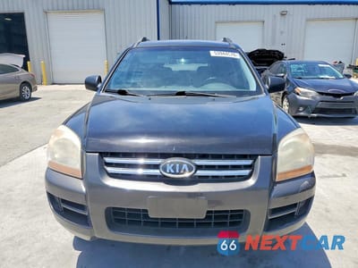 Piąte zdjęcie samochodu w środku: 2006 KIA SPORTAGE LX VIN:KNDJF724767200773 - miniatura