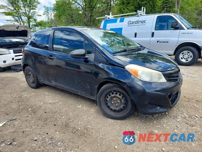 Czwarte zdjęcie samochodu z boku: 2014 TOYOTA YARIS 3-DOOR L VIN:JTDJTUD35ED573595 - miniatura