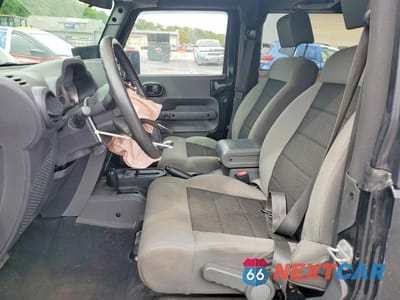 Zdjęcie 7 z 13 samochodu: 2010 JEEP WRANGLER SPORT VIN:1J4AA2D14AL102475 - miniatura