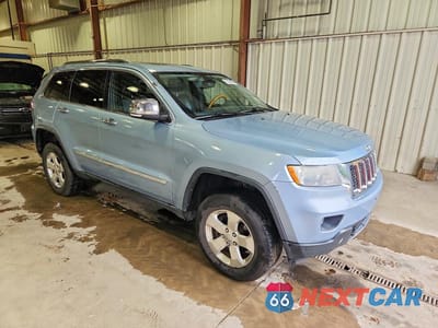 Czwarte zdjęcie samochodu z boku: 2012 JEEP GRAND CHEROKEE OVERLAND VIN:1C4RJFCG4CC344479 - miniatura