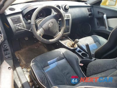 Zdjęcie 8 z 12 samochodu: 2005 HYUNDAI TIBURON GT VIN:KMHHN65F75U175216 - miniatura