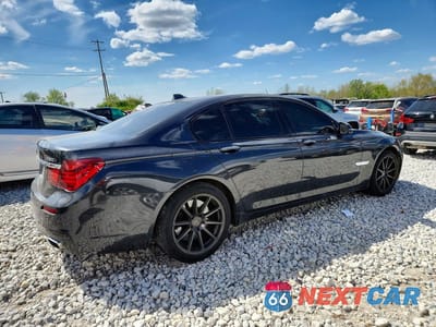 Trzecie zdjęcie samochodu z tyłu: 2015 BMW 750 XI VIN:WBAYB6C5XFD966121 - miniatura