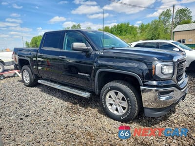 Czwarte zdjęcie samochodu z boku: 2018 GMC SIERRA K1500 VIN:3GTU2LEC4JG203812 - miniatura