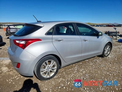 Trzecie zdjęcie samochodu z tyłu: 2014 HYUNDAI ELANTRA GT BASE VIN:KMHD35LH4EU215464 - miniatura