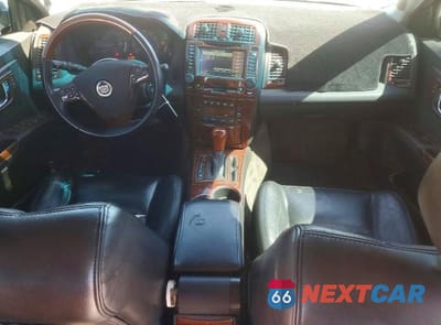 Zdjęcie 8 z 12 samochodu: 2004 CADILLAC CTS VIN:1G6DM577040180482 - miniatura