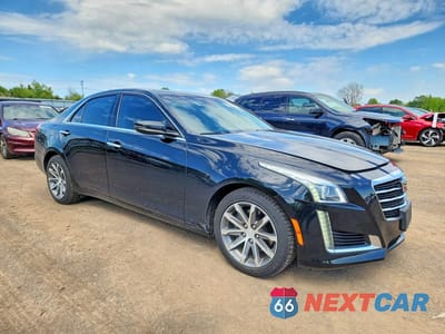 Czwarte zdjęcie samochodu z boku: 2016 CADILLAC CTS LUXURY COLLECTION VIN:1G6AX5SX2G0120659 - miniatura