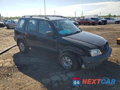 Czwarte zdjęcie samochodu z boku: 1999 HONDA CR-V LX VIN:JHLRD1841XC067968 - miniatura