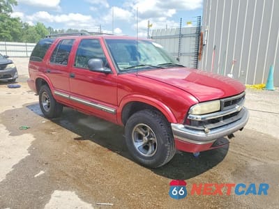 Czwarte zdjęcie samochodu z boku: 2000 CHEVROLET BLAZER VIN:1GNCS13W7Y2176970 - miniatura