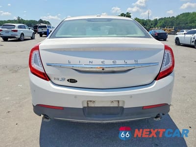 Zdjęcie 6 z 12 samochodu: 2015 LINCOLN MKS VIN:1LNHL9DK3FG603448 - miniatura