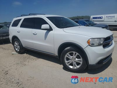 Czwarte zdjęcie samochodu z boku: 2013 DODGE DURANGO SXT VIN:1C4RDJAG7DC658982 - miniatura