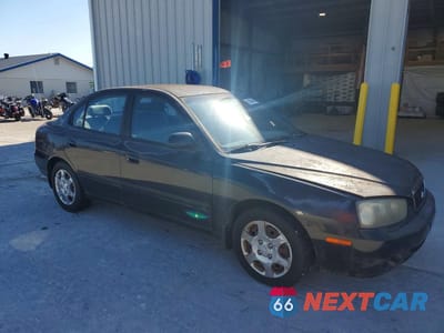 Czwarte zdjęcie samochodu z boku: 2002 HYUNDAI ELANTRA GLS VIN:KMHDN45D32U301746 - miniatura
