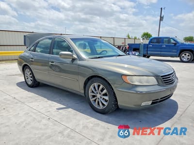 Czwarte zdjęcie samochodu z boku: 2006 HYUNDAI AZERA VIN:KMHFC46FX6A079115 - miniatura