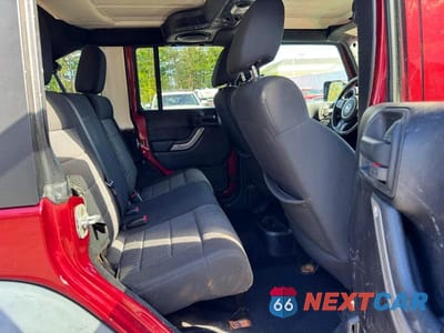 Zdjęcie 8 z 11 samochodu: 2012 JEEP WRANGLER UNLIMITED SPORT VIN:1C4BJWDG0CL121971 - miniatura