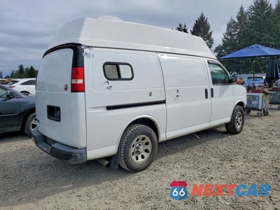 Trzecie zdjęcie samochodu z tyłu: 2014 CHEV EXPRESS G1500 VIN:1GCSHAF44E1140362 - miniatura