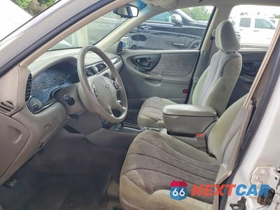 Zdjęcie 7 z 12 samochodu: 2000 CHEVROLET MALIBU VIN:1G1ND52J6Y6119055 - miniatura