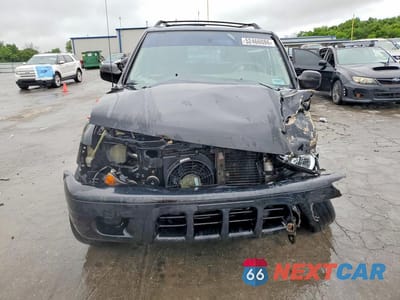Piąte zdjęcie samochodu w środku: 2002 ISUZU RODEO S VIN:4S2DM58W524326890 - miniatura