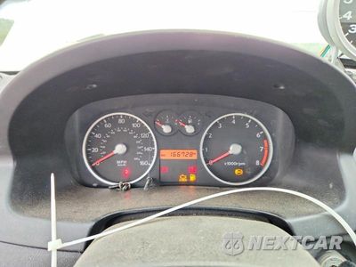 Zdjęcie 9 z 12 samochodu: 2003 HYUNDAI TIBURON GT VIN:KMHHN65F23U014608 - miniatura