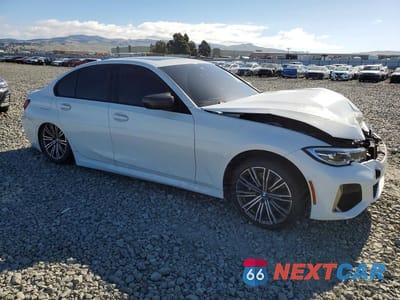 Czwarte zdjęcie samochodu z boku: 2020 BMW M340I VIN:WBA5U7C07LFH32979 - miniatura