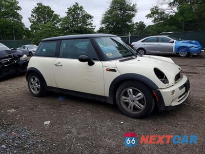 Czwarte zdjęcie samochodu z boku: 2006 MINI COOPER VIN:WMWRC33546TJ78330 - miniatura