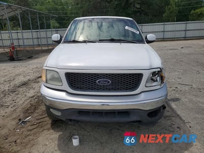 Piąte zdjęcie samochodu w środku: 2000 FORD F150 VIN:1FTRX18L3YNA38893 - miniatura