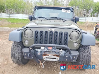 Piąte zdjęcie samochodu w środku: 2015 JEEP WRANGLER UNLIMITED SPORT VIN:1C4BJWDG7FL703134 - miniatura