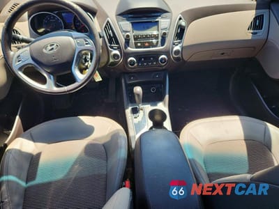 Zdjęcie 8 z 12 samochodu: 2012 HYUNDAI TUCSON GLS VIN:KM8JUCAC4CU534775 - miniatura