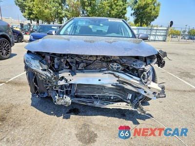 Piąte zdjęcie samochodu w środku: 2019 TOYOTA CAMRY LE VIN:4T1B31HK9KU512391 - miniatura