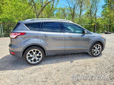 Trzecie zdjęcie samochodu z tyłu: 2014 FORD ESCAPE TITANIUM VIN:1FMCU0JX8EUC16574 - miniatura