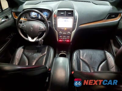 Zdjęcie 8 z 13 samochodu: 2018 LINCOLN MKC SELECT VIN:5LMCJ2C90JUL00589 - miniatura