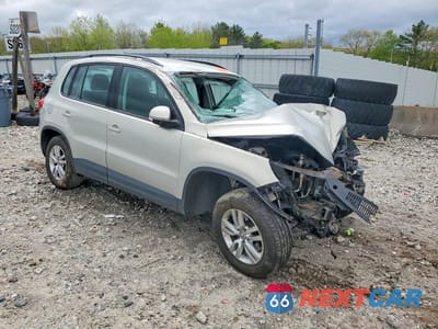 Czwarte zdjęcie samochodu z boku: 2015 VOLKSWAGEN TIGUAN S VIN:WVGAV7AX0FW594505 - miniatura