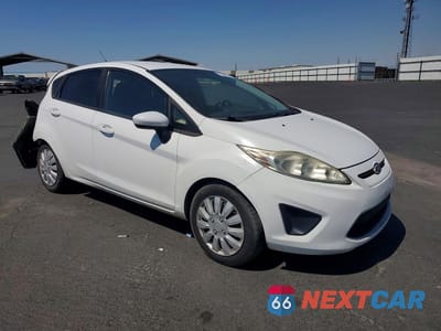 Czwarte zdjęcie samochodu z boku: 2012 FORD FIESTA SE VIN:3FADP4EJ1CM207963 - miniatura