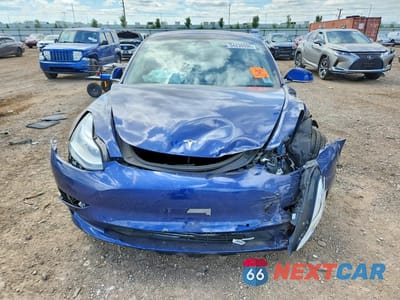 Piąte zdjęcie samochodu w środku: 2018 TESLA MODEL 3 VIN:5YJ3E1EB9JF095191 - miniatura