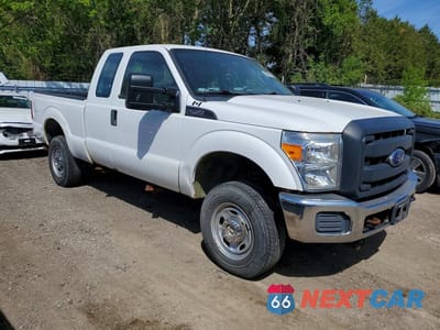 Czwarte zdjęcie samochodu z boku: 2014 FORD F250 SUPER DUTY VIN:1FT7X2B62EEA87725 - miniatura