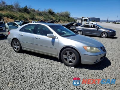 Czwarte zdjęcie samochodu z boku: 2005 ACURA RL VIN:JH4KB16535C020453 - miniatura