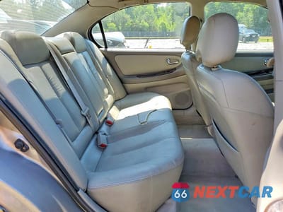 Zdjęcie 10 z 12 samochodu: 2000 NISSAN MAXIMA GXE VIN:JN1CA31D6YT709946 - miniatura
