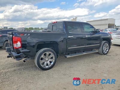 Trzecie zdjęcie samochodu z tyłu: 2018 CHEVROLET SILVERADO K1500 LTZ VIN:3GCUKSEC7JG134687 - miniatura