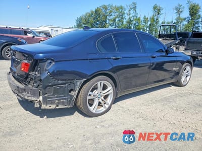 Trzecie zdjęcie samochodu z tyłu: 2011 BMW 740 I VIN:WBAKA4C52BC392093 - miniatura