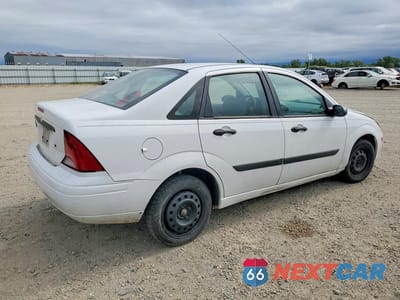 Trzecie zdjęcie samochodu z tyłu: 2004 FORD FOCUS LX VIN:1FAFP33Z24W138827 - miniatura