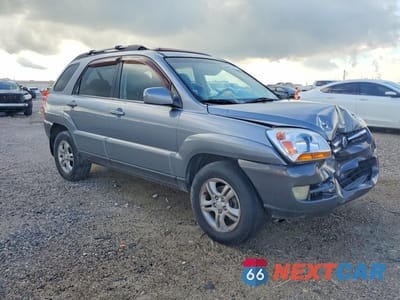 Czwarte zdjęcie samochodu z boku: 2005 KIA SPORTAGE LX VIN:KNDJF723357115208 - miniatura