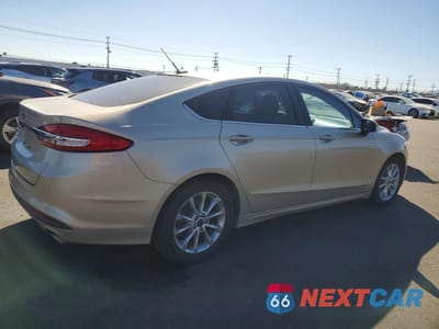 Trzecie zdjęcie samochodu z tyłu: 2017 FORD FUSION SE VIN:3FA6P0H71HR382497 - miniatura