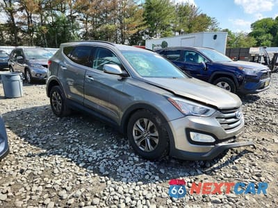 Czwarte zdjęcie samochodu z boku: 2014 HYUNDAI SANTA FE SPORT 2.4L VIN:5XYZUDLB4EG223949 - miniatura
