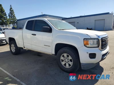 Czwarte zdjęcie samochodu z boku: 2015 GMC CANYON VIN:1GTH5AEA3F1138520 - miniatura