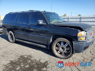 Czwarte zdjęcie samochodu z boku: 2005 GMC YUKON XL DENALI VIN:1GKFK66U55J221326 - miniatura