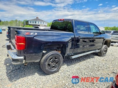 Trzecie zdjęcie samochodu z tyłu: 2018 CHEVROLET SILVERADO K1500 LT VIN:3GCUKREC1JG103511 - miniatura